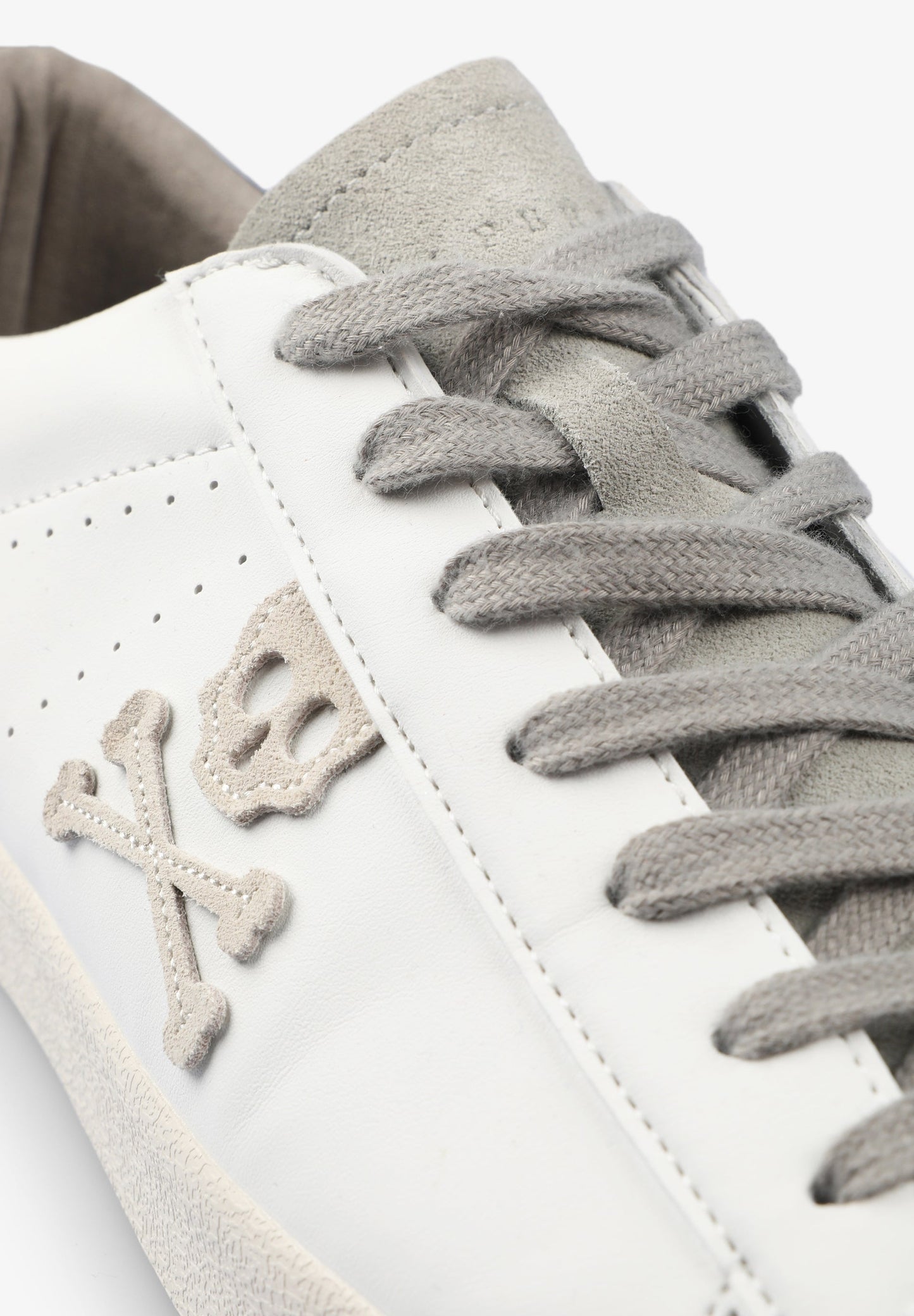 SNEAKERS BAJAS CALAVERA LATERAL