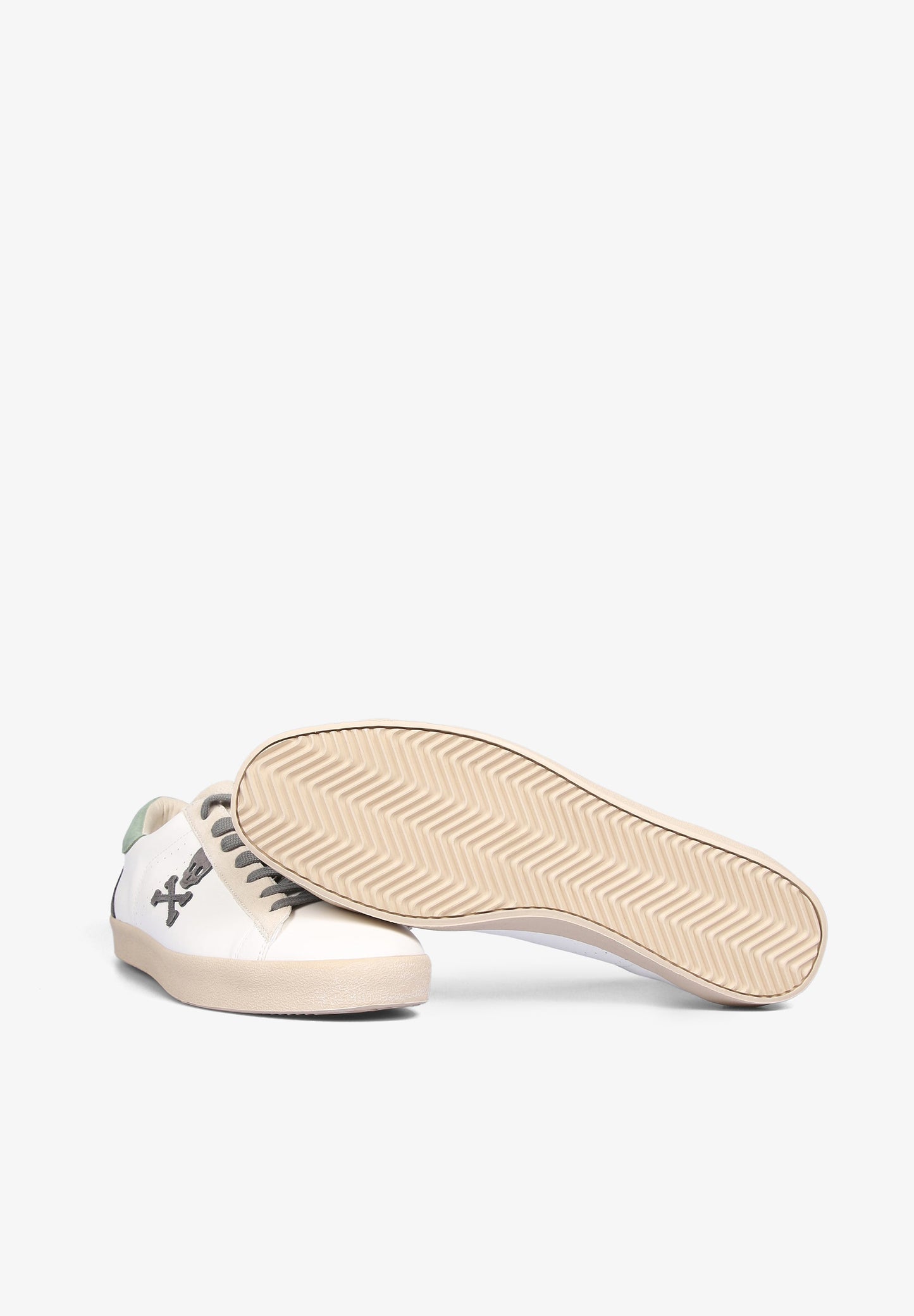 SNEAKERS PIEL BAJAS CALAVERA CONTRASTE