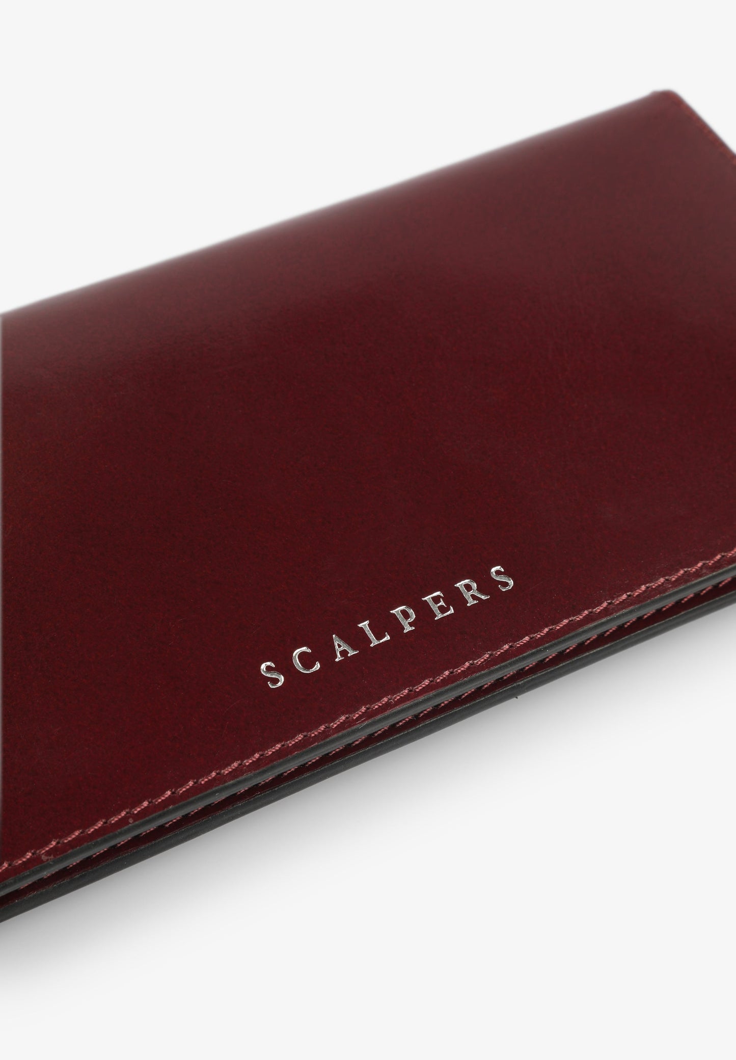 CARTERA PIEL TACHAS