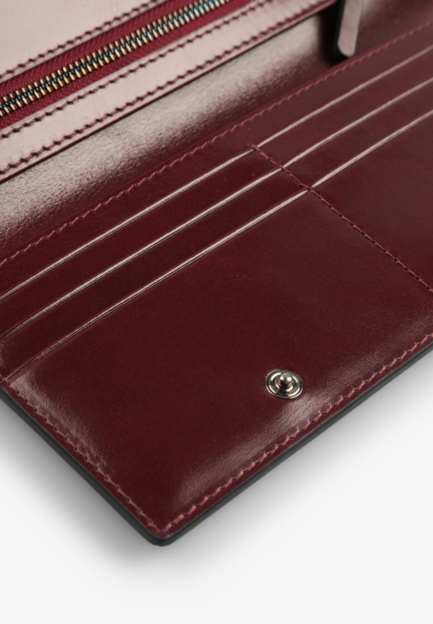 CARTERA PIEL TACHAS