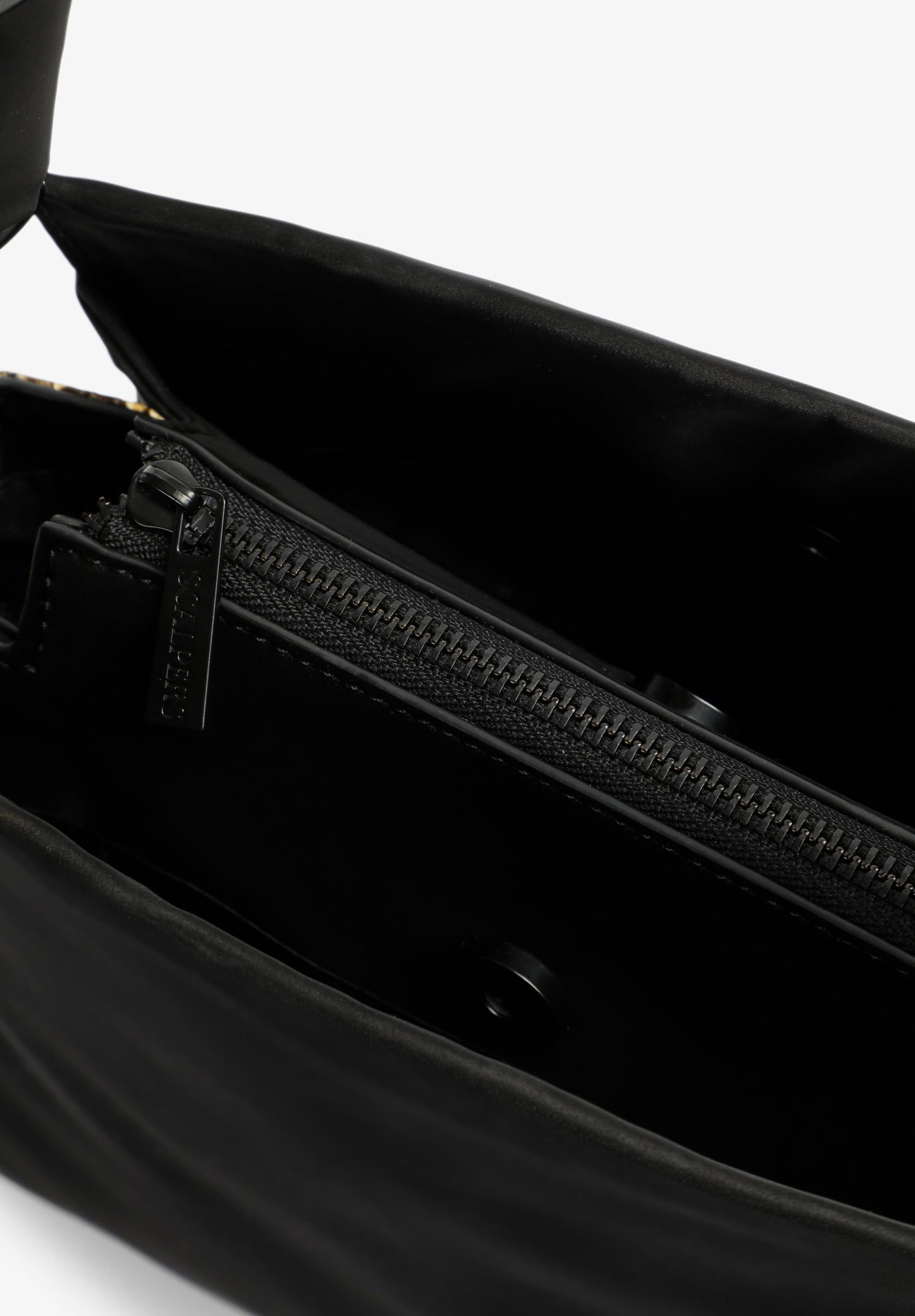 BOLSO TRENZADO DETALLES ANIMAL PRINT